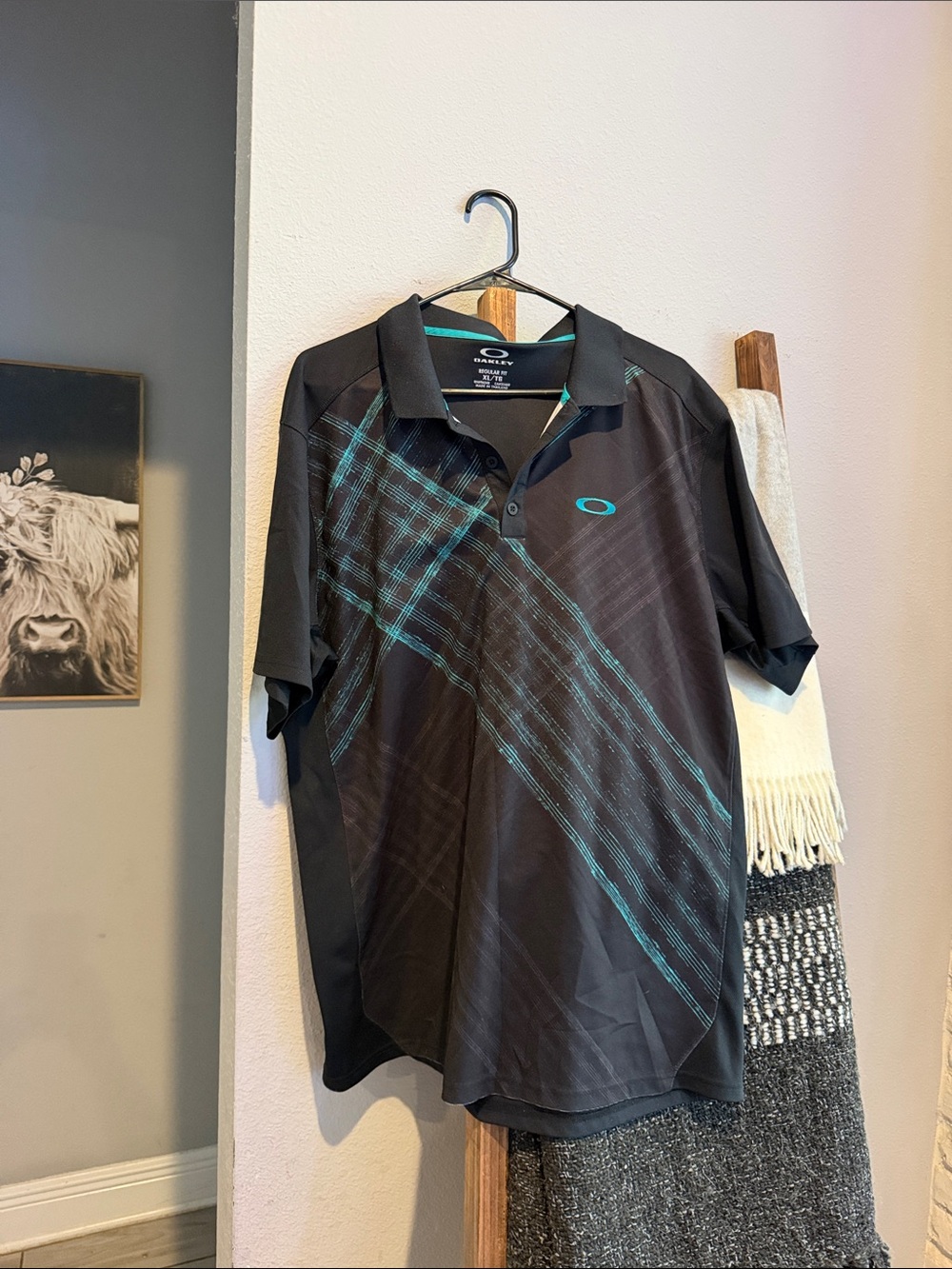 Oakley Black Polo with Teal Diagonal Graphic